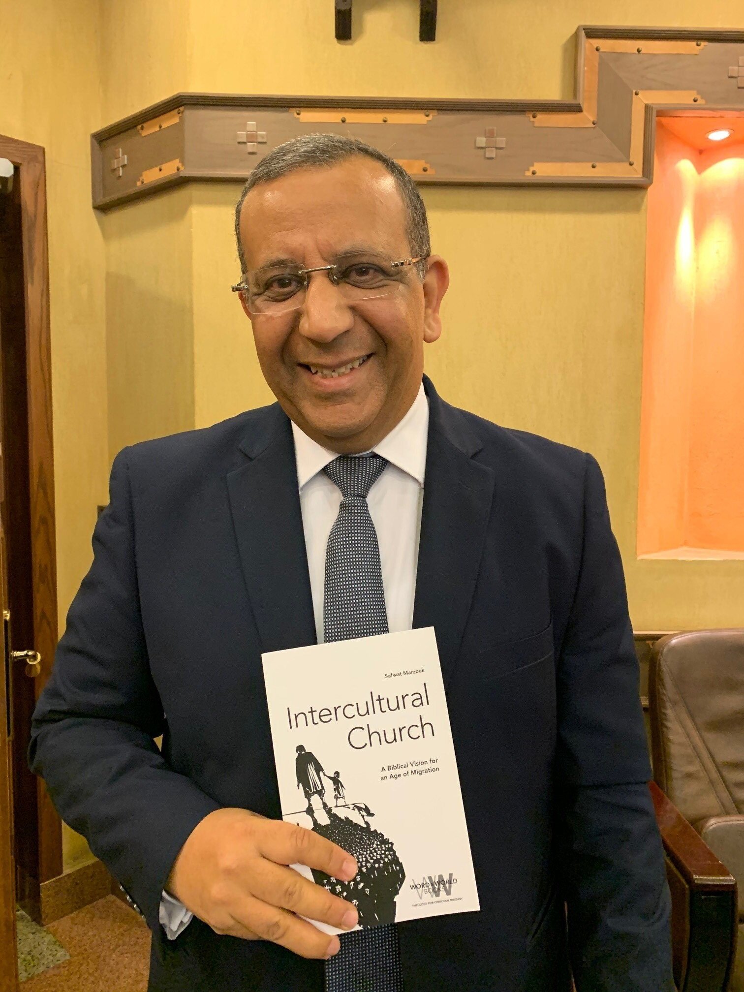  Dr. Atef with a book just published in the U.S. by a 2001 ETSC grad, Dr. Safwat Marzouk 