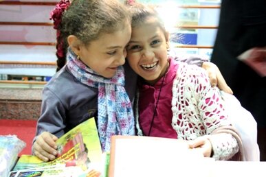  Children happy with Kingo books at Cairo International Book Fair  