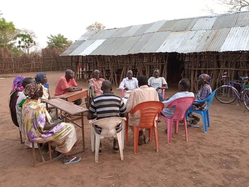 John Jock meeting with teachers