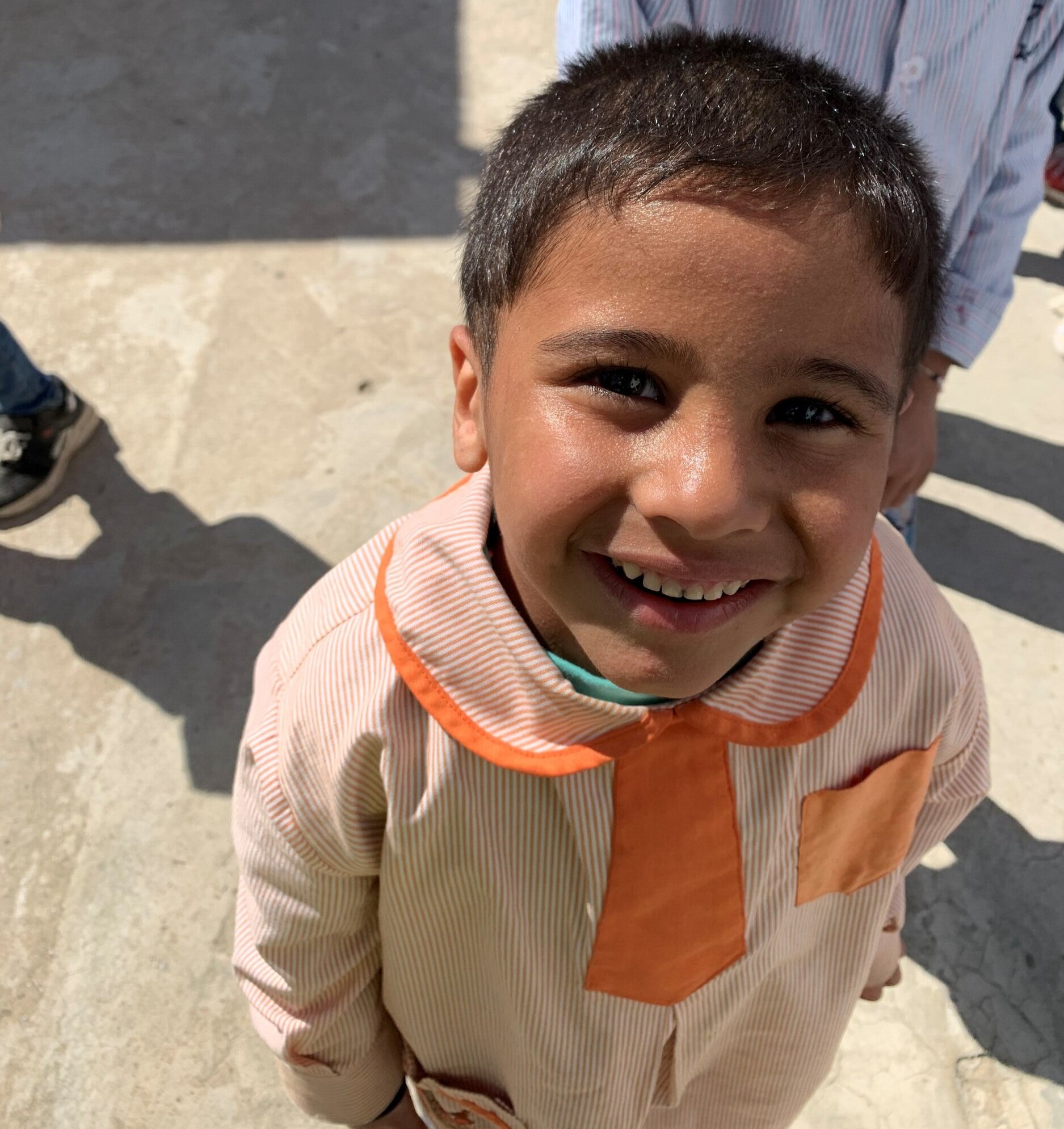 Syrian refugees, like this little one, eagerly await the reopening of the schools run by our Presbyterian family