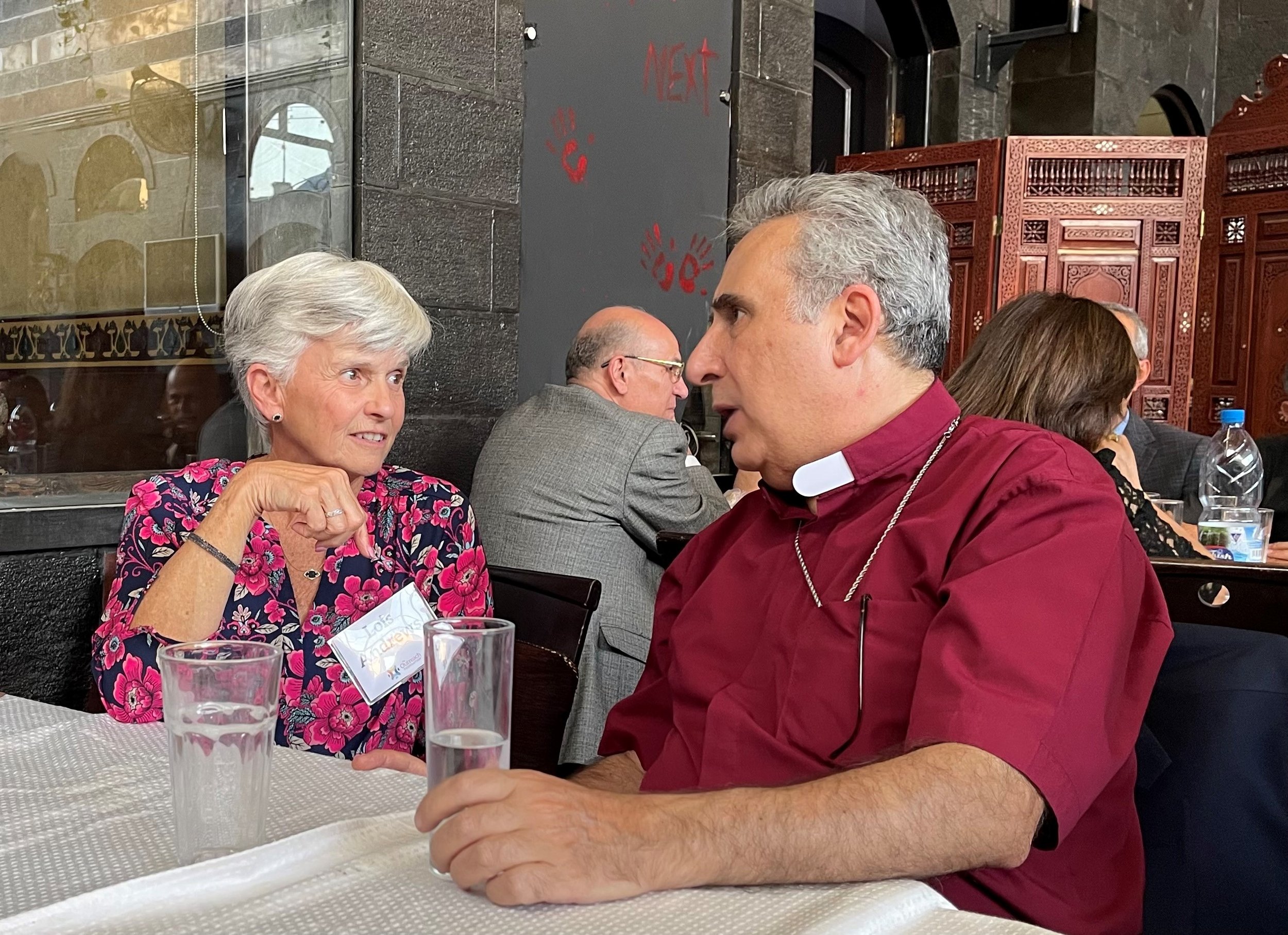  Lois deep in conversation at lunch with Rev. Joseph Kassab, the General Secretary of the National Evangelical Synod of Syria and Lebanon  
