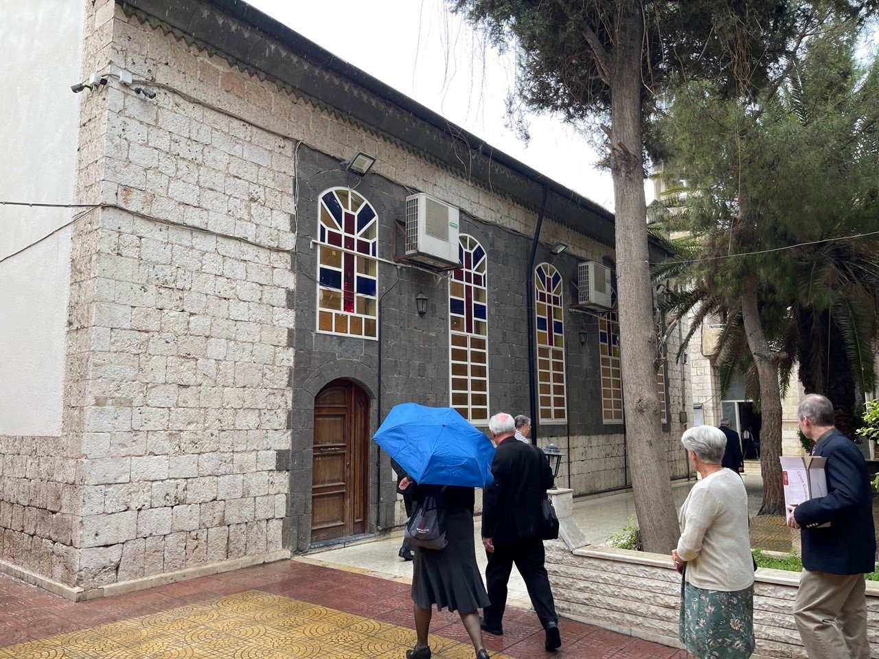  Arriving for worship at the Damascus Church on a rainy Reformation Day 