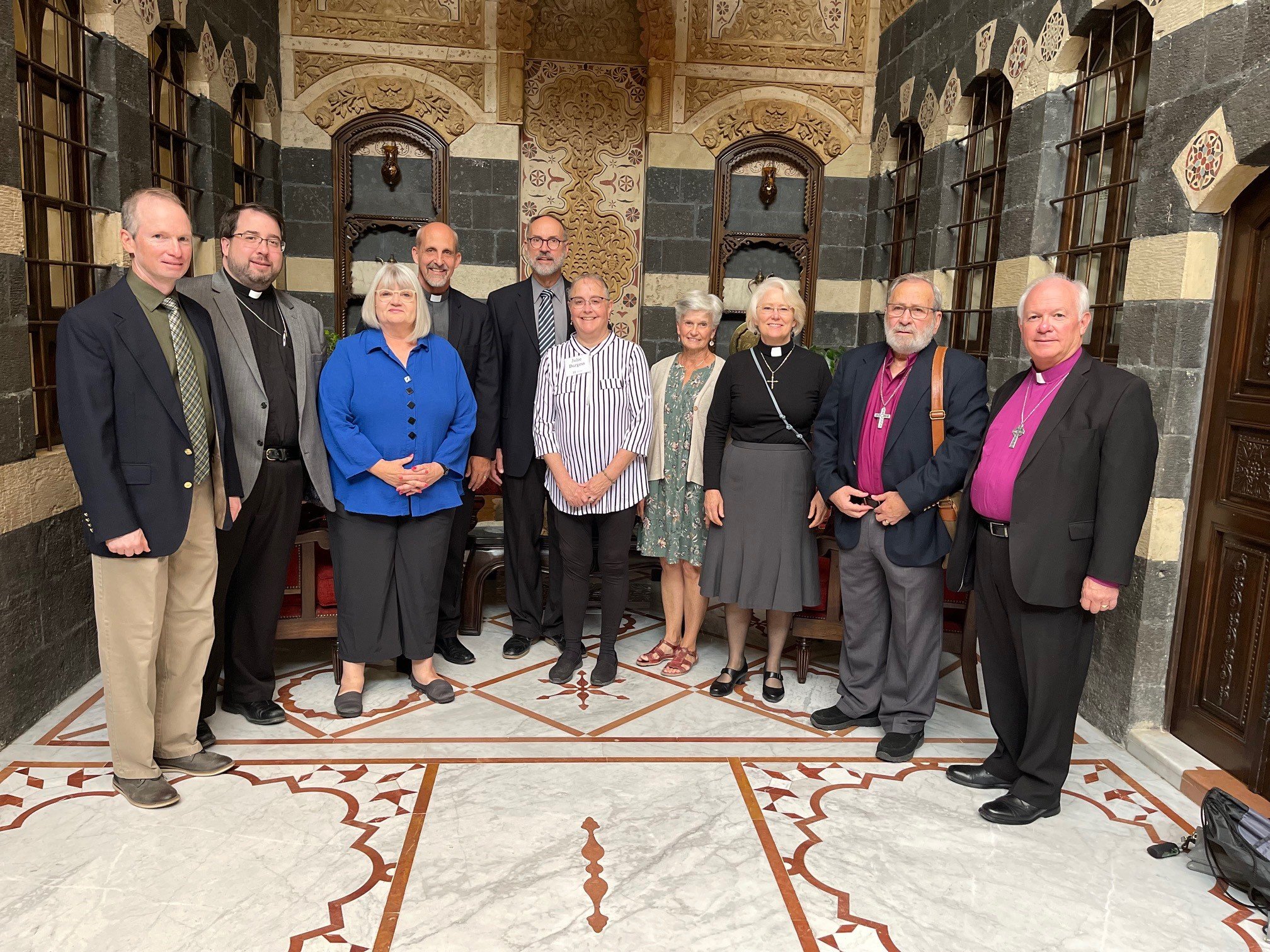  Our team headed to Church on Reformation Sunday (from left to right): Kelly Green, Tony Lorenz, Marilyn Borst, Mike Kuhn, Steve Burgess, Julie Burgess, Lois Andrews, Nancy Fox, Nuhad Tomeh, Jack Baca 