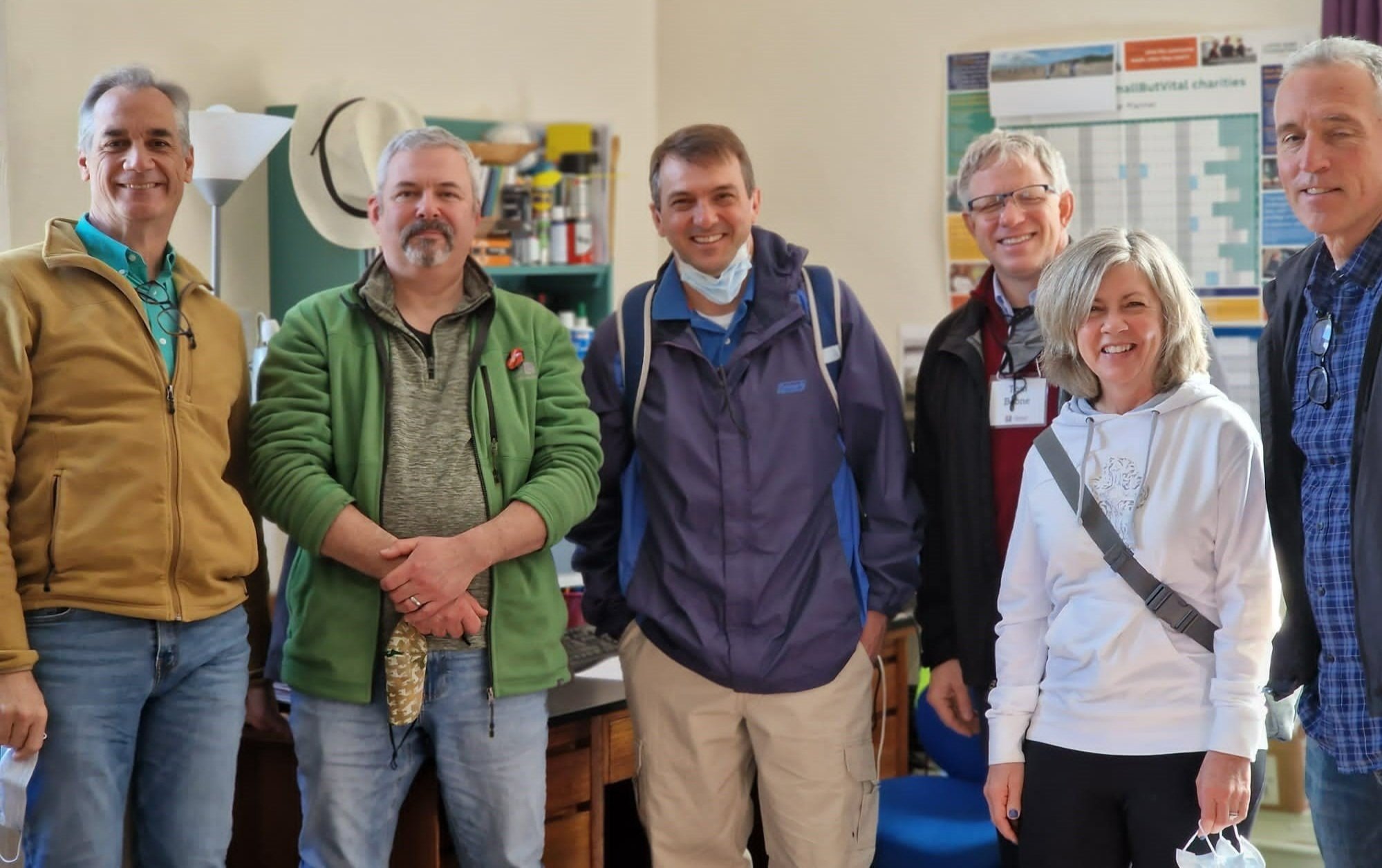   Ewan Roberts, Centre Manager of Asylum Link, meets with part of The Outreach Foundation team  
