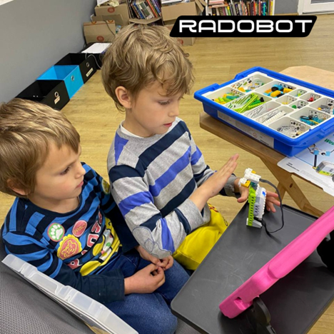 Boys learning programming and robotics at “Radobot” camp near Lviv