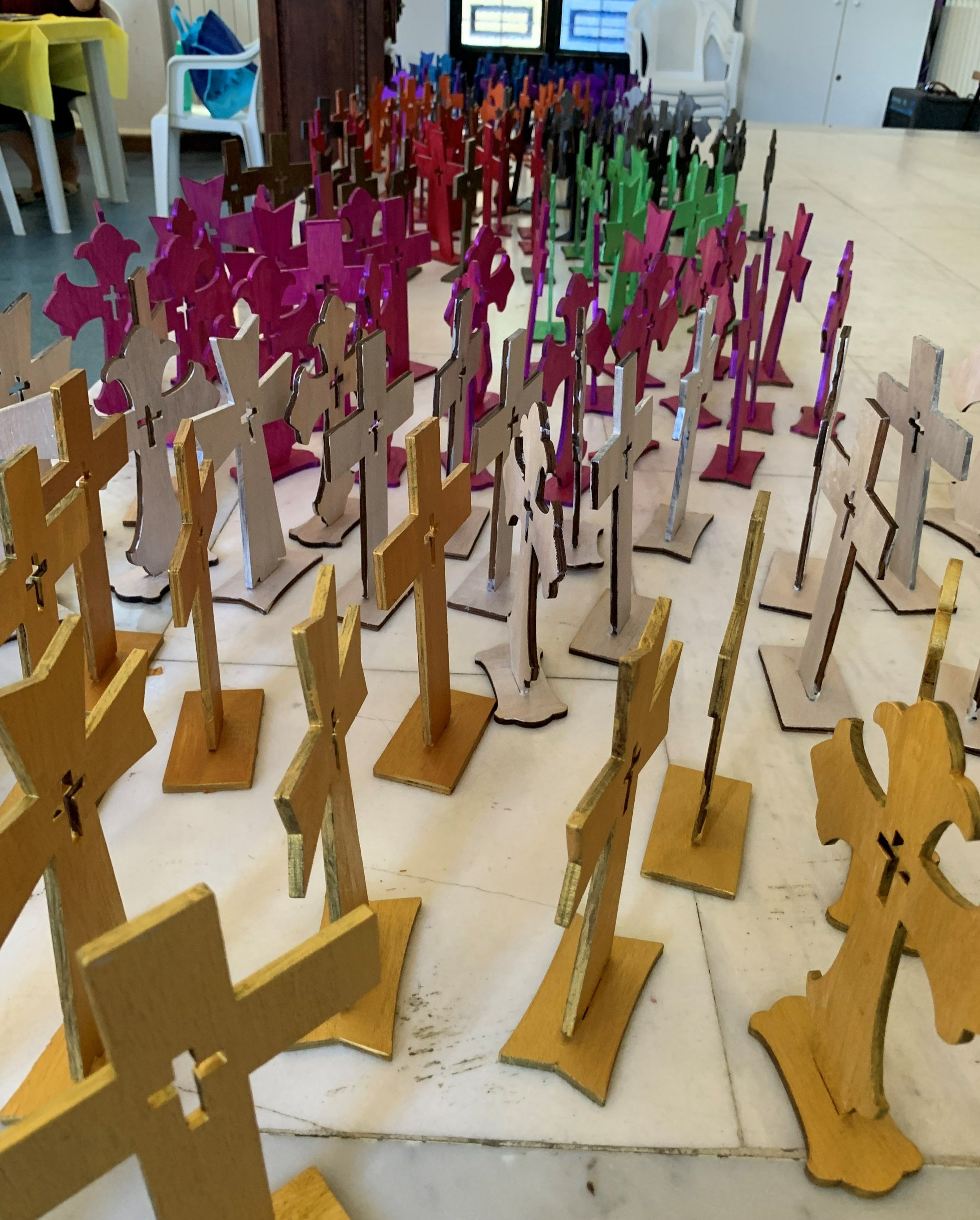   Crosses ready to be decorated by the ladies for their craft project  