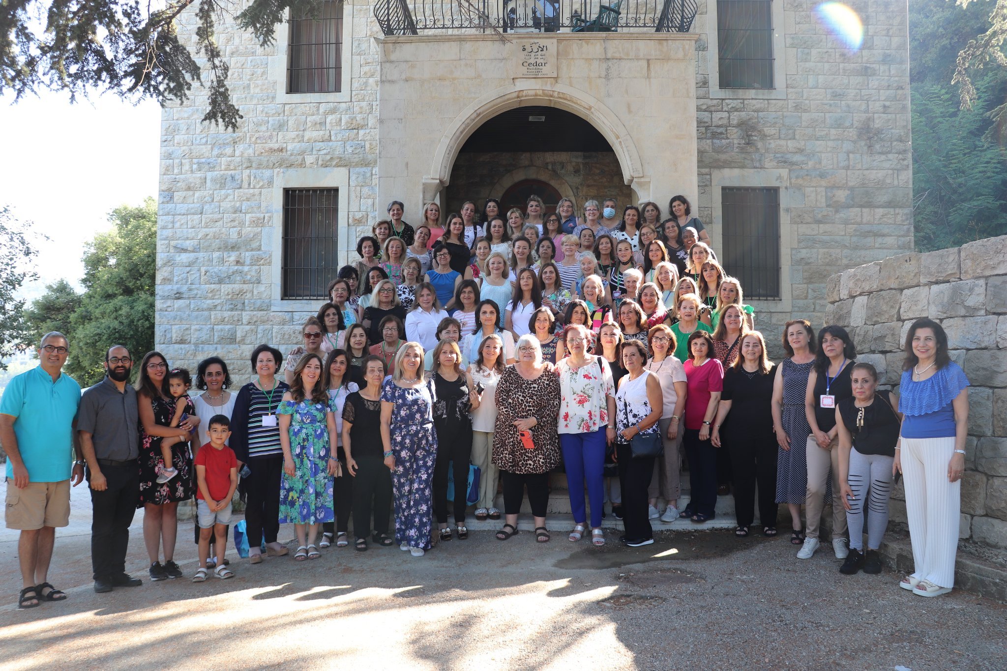 Conference women and leaders gathered on the steps of the Cedars building at Dhour Chouier
