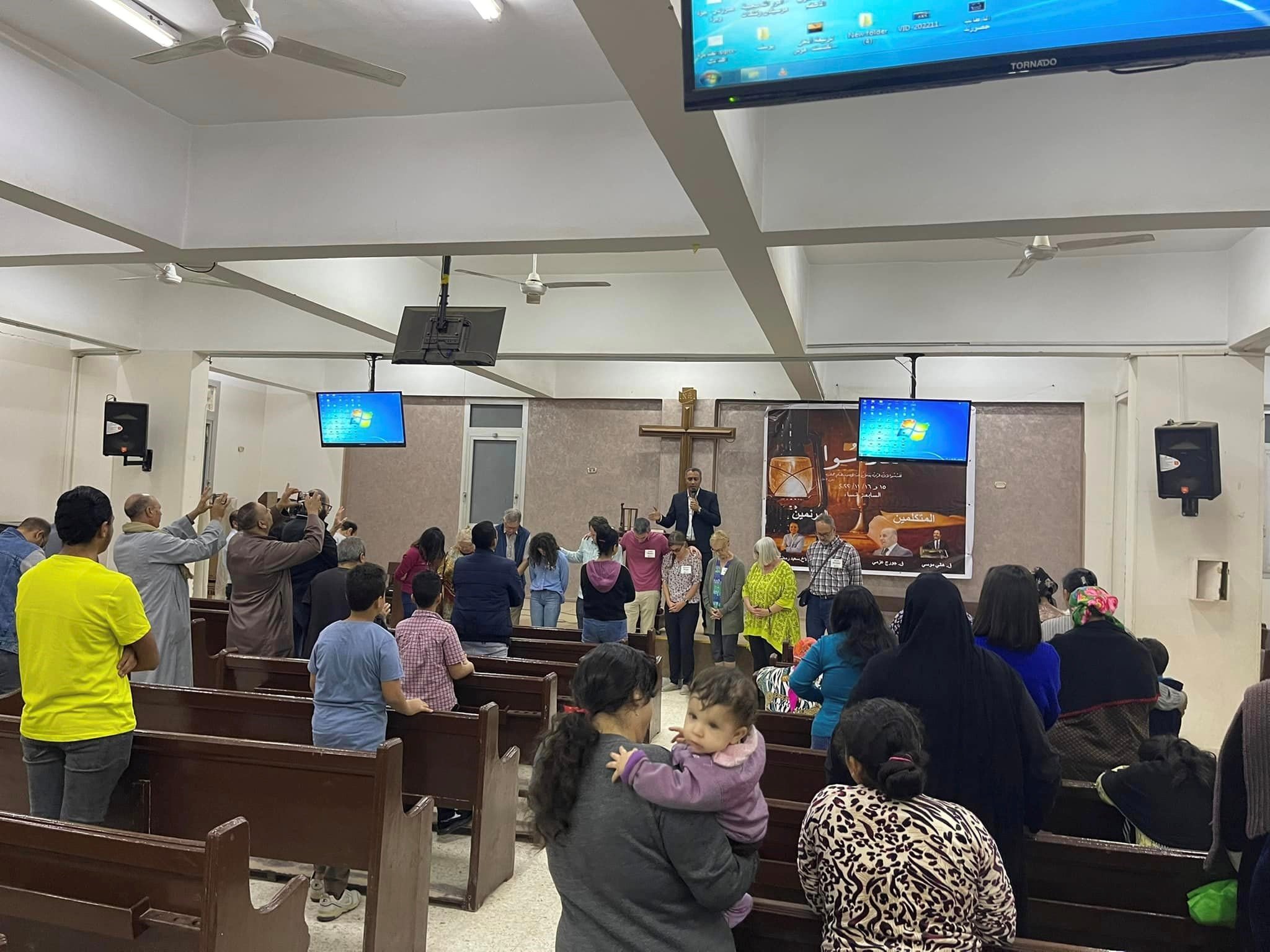  One part of the family (the Presbyterian Church in Haganna, a Cairo suburb) prays for another  (our Outreach team as we soon begin our long journeys home) 