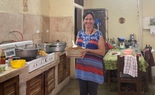  Laidine, one of the elders at Sancti Spiritus, helps serve us a delicious lunch 