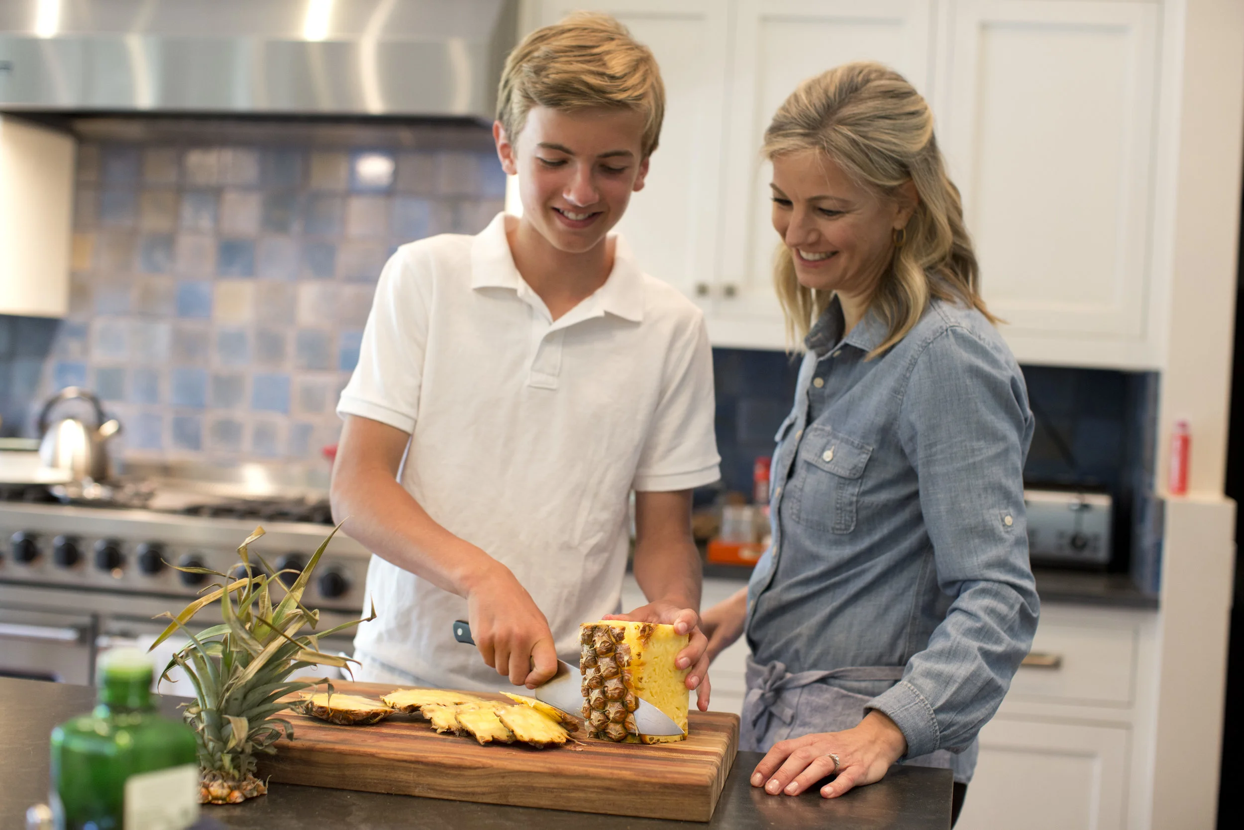Dr. Julia cooks with her son