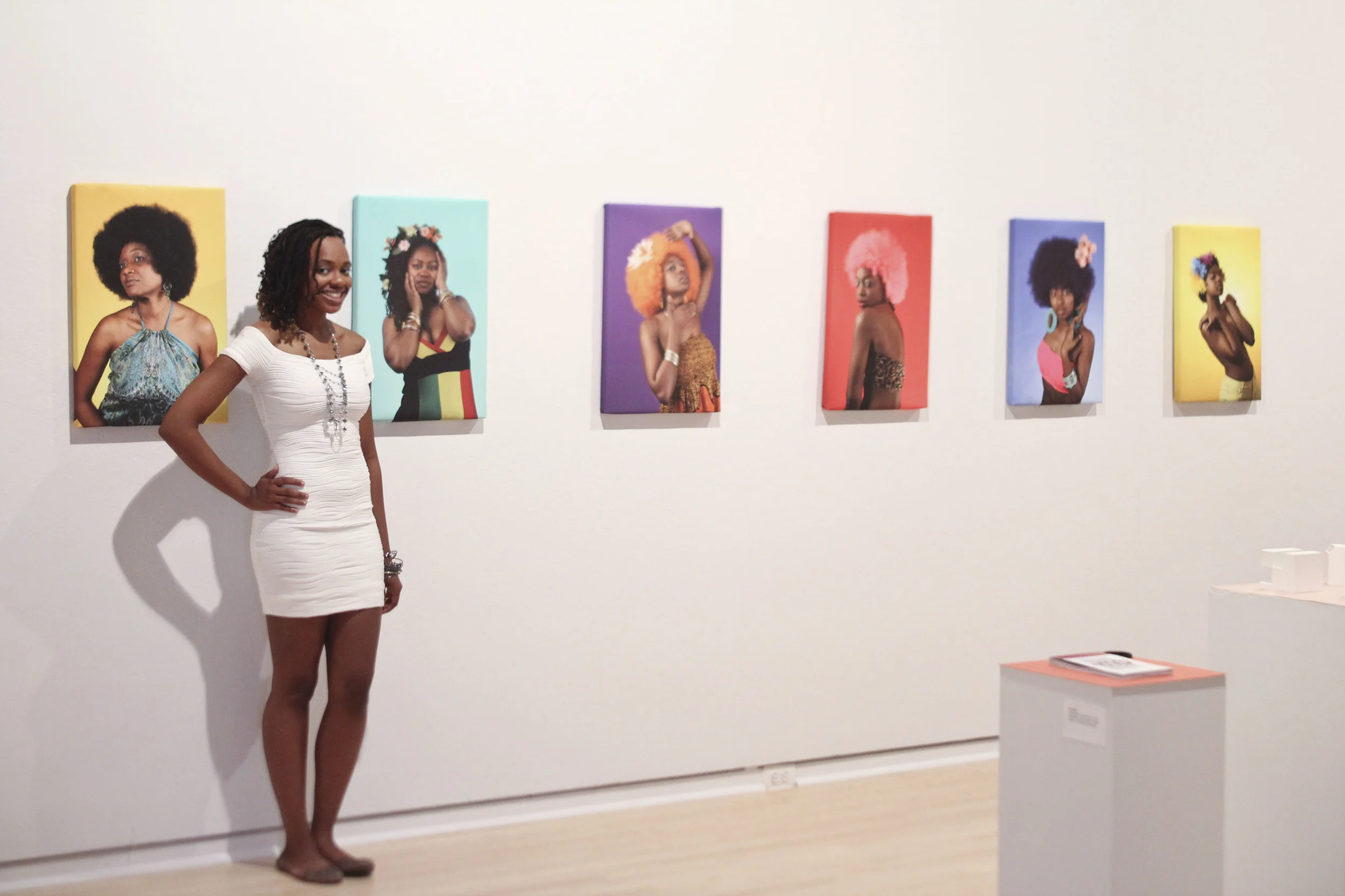 Carlisha standing with The House of Roots photo series at the Center of Art Design and Visual Culture (UMBC). Senior Exit Exhibition // University of Maryland Baltimore County (CADVC)