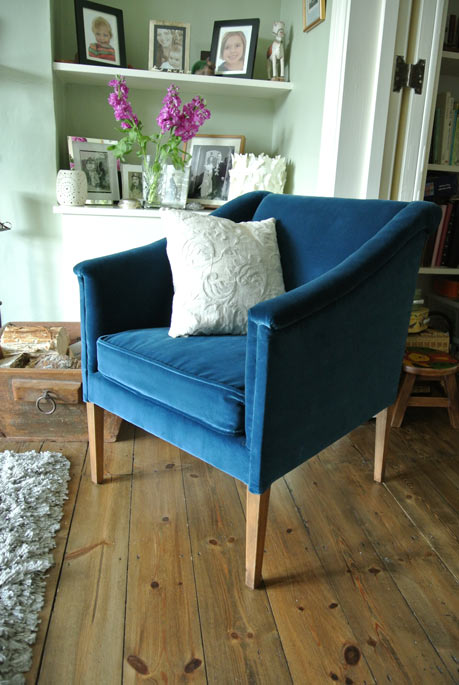  Fully reupholstered and finished in Harlequin's 'folia velvet' in navy and a dark oak stain on the legs 
