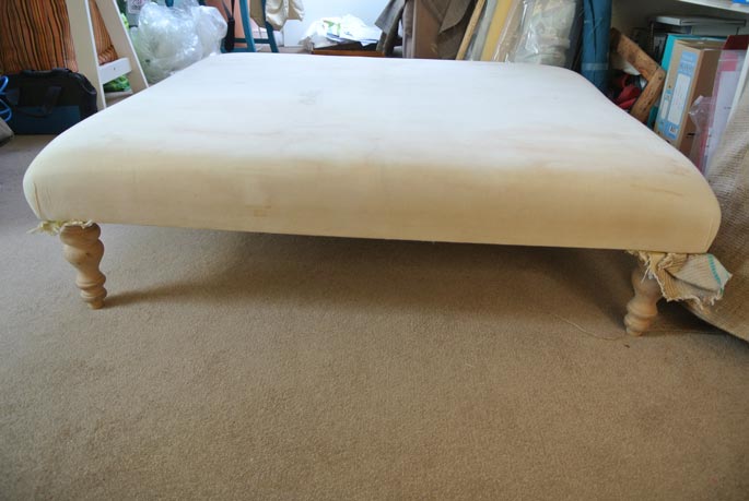  Large footstool before... 