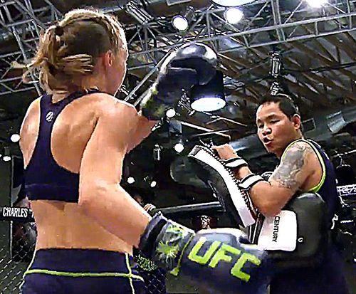 Jongsanan "Woodenman" training Rose Namajunas on Season 20 of The Ultimate Fighter.