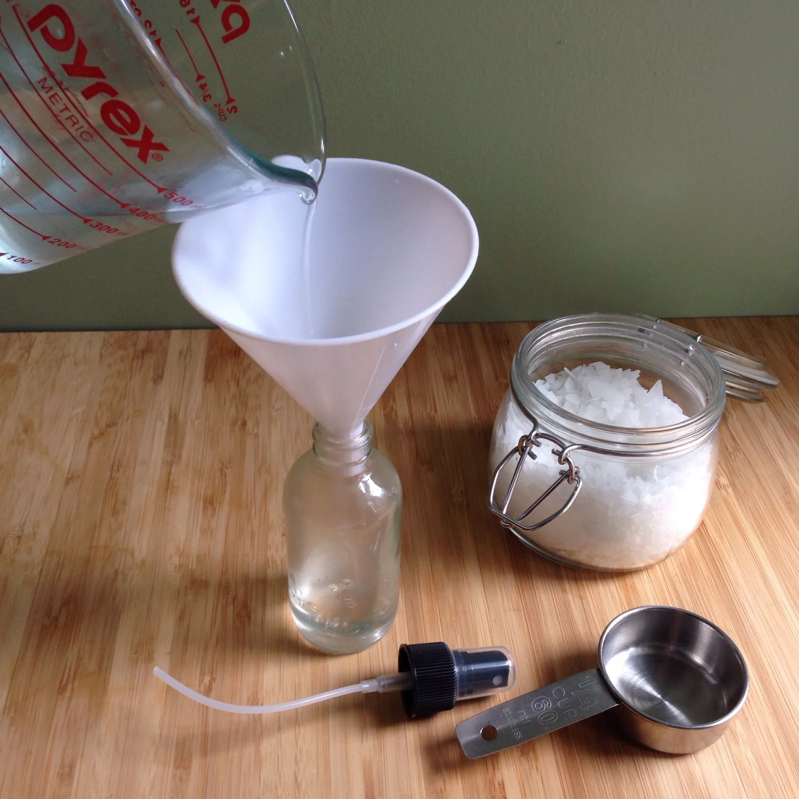 Add to a glass spray bottle with remaining ingredients