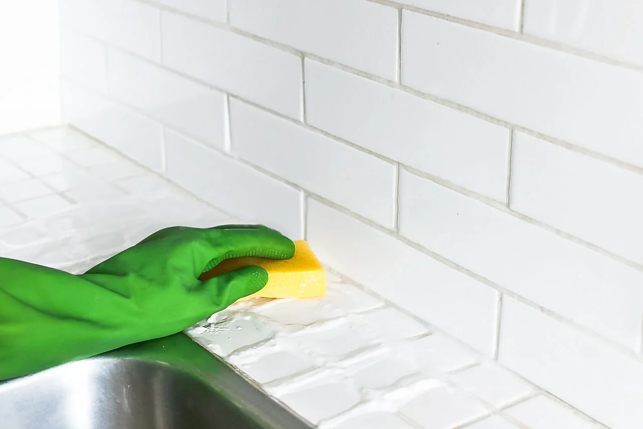 Use a wet sponge, to wipe and rinse away