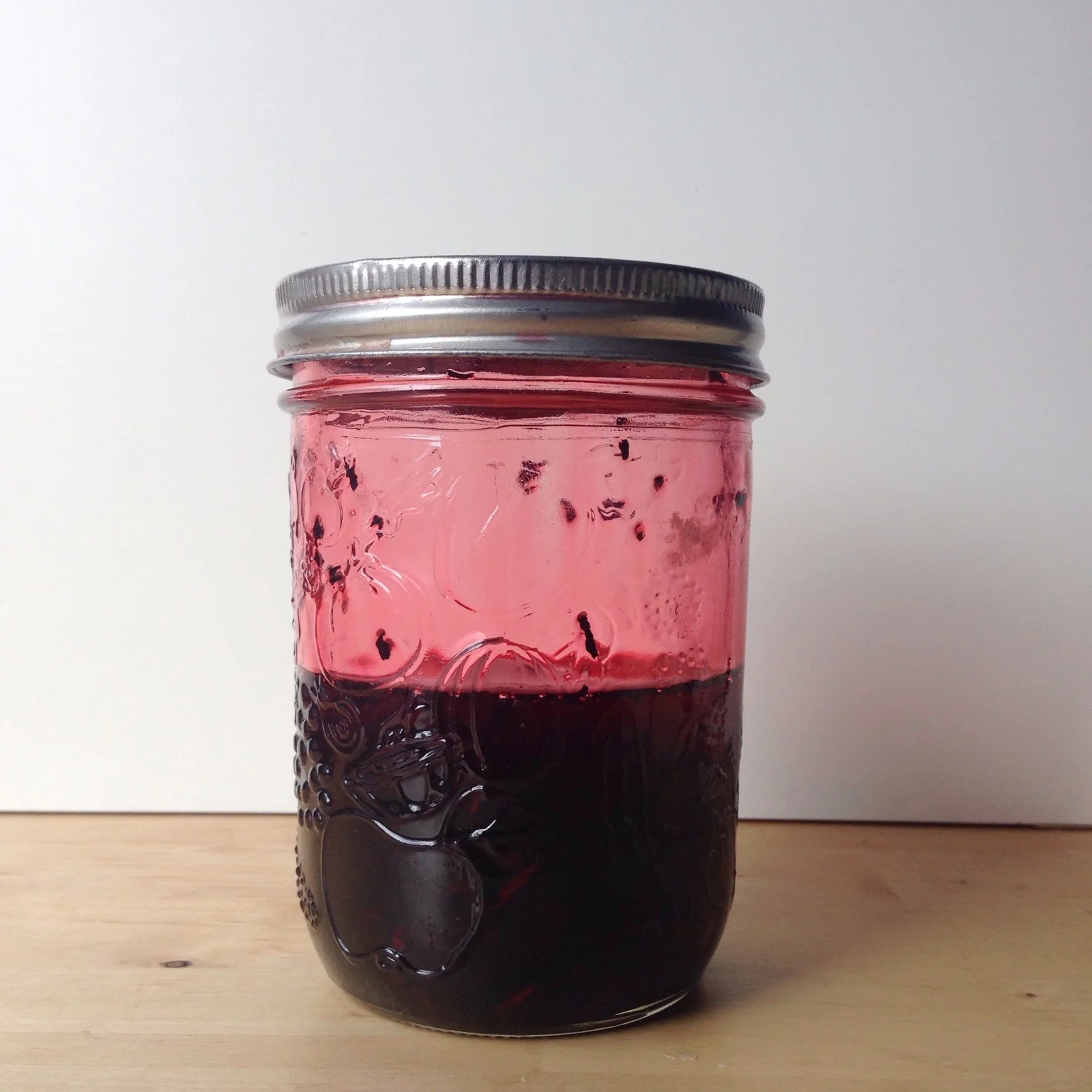 Infuse oil with alkanet root for a few hours to overnight. The more you use, the redder the oil will become.