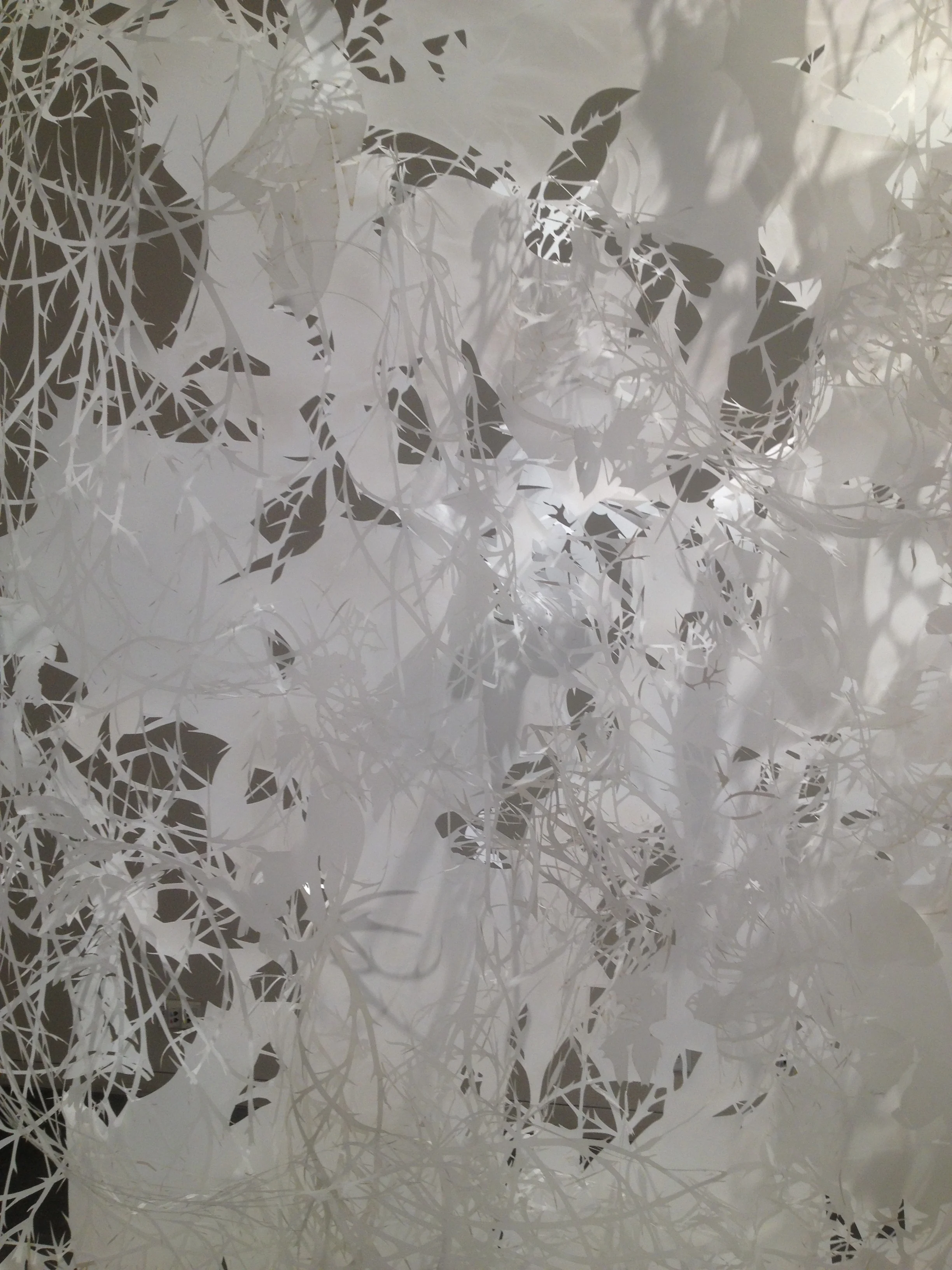   The Relentless Memorial   Installation view, inside panel showing reflections and shadows. 