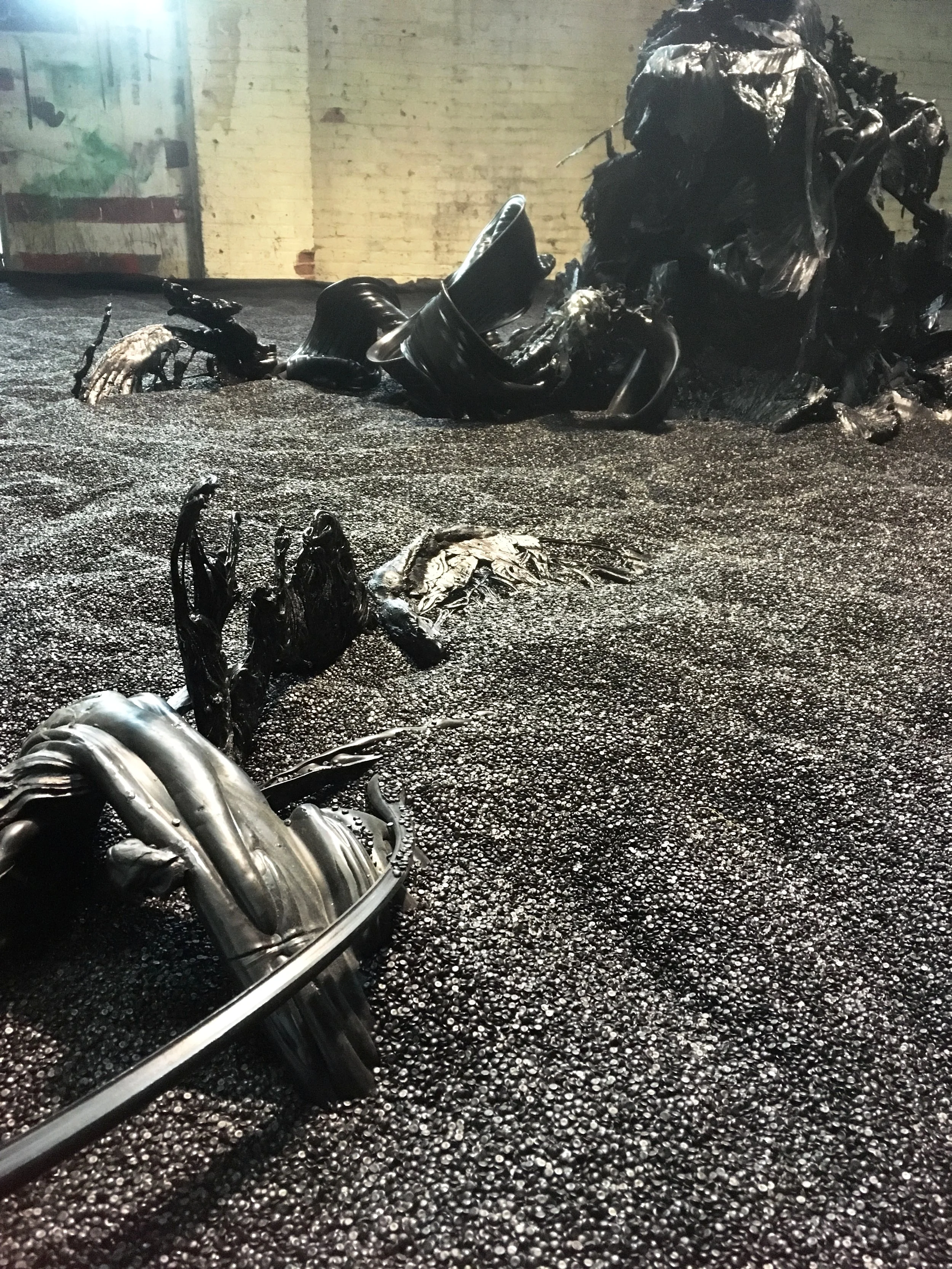  Installation View with recycled “ribbons” of HDPE plastic. This plastic is extruded by the recycling machine in between the production of products (nurdles, pipes, etc).  