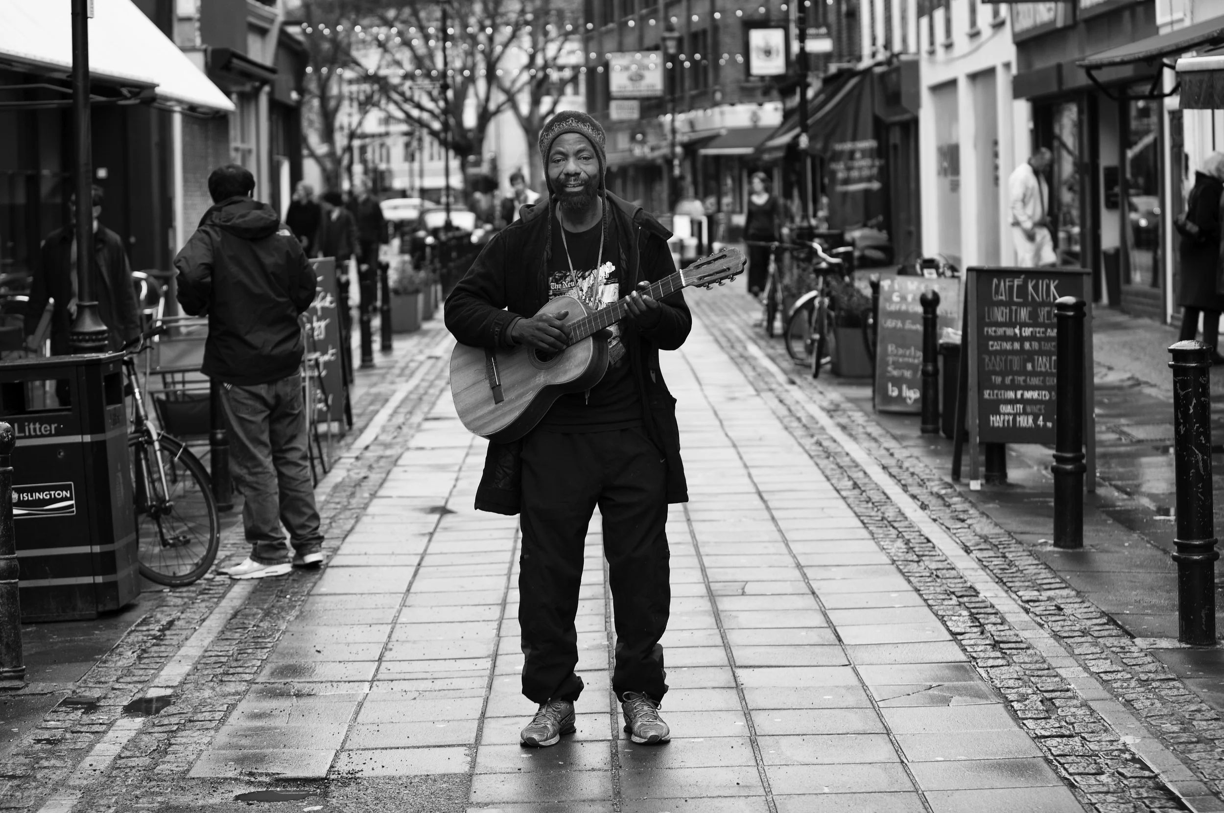 'The Busker' taken in Exmouth market, London