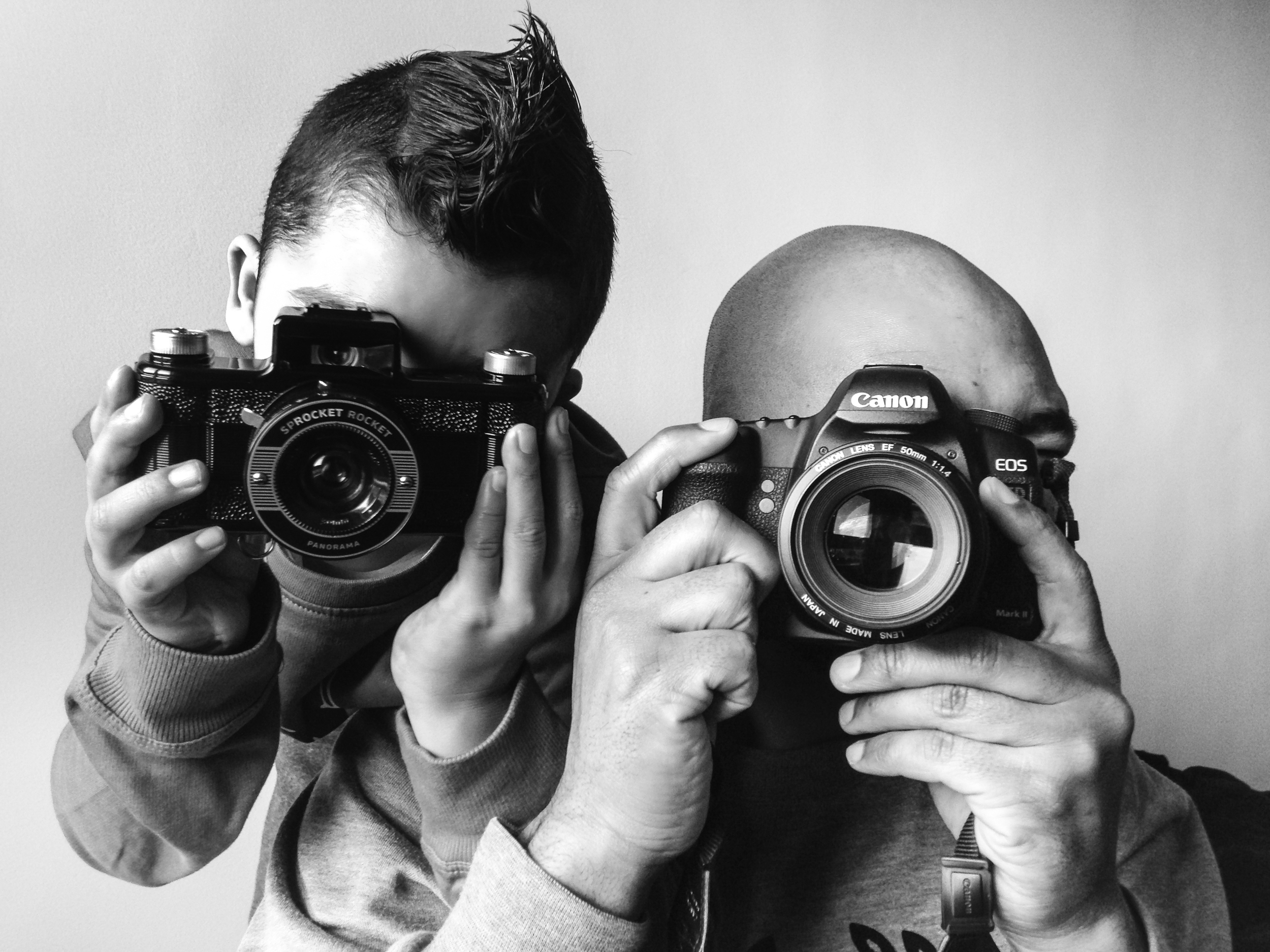 How we roll father and son portrait with cameras