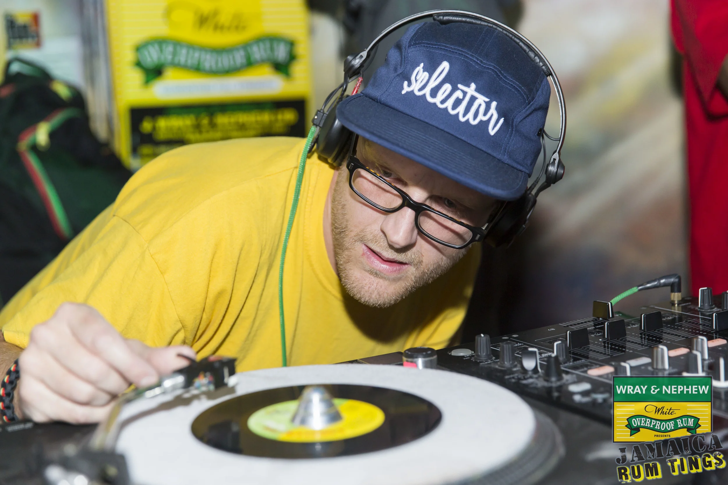 Pete Rowland (suspect packages) spinning some vinyl at Wray and Nephew Rum tings event
