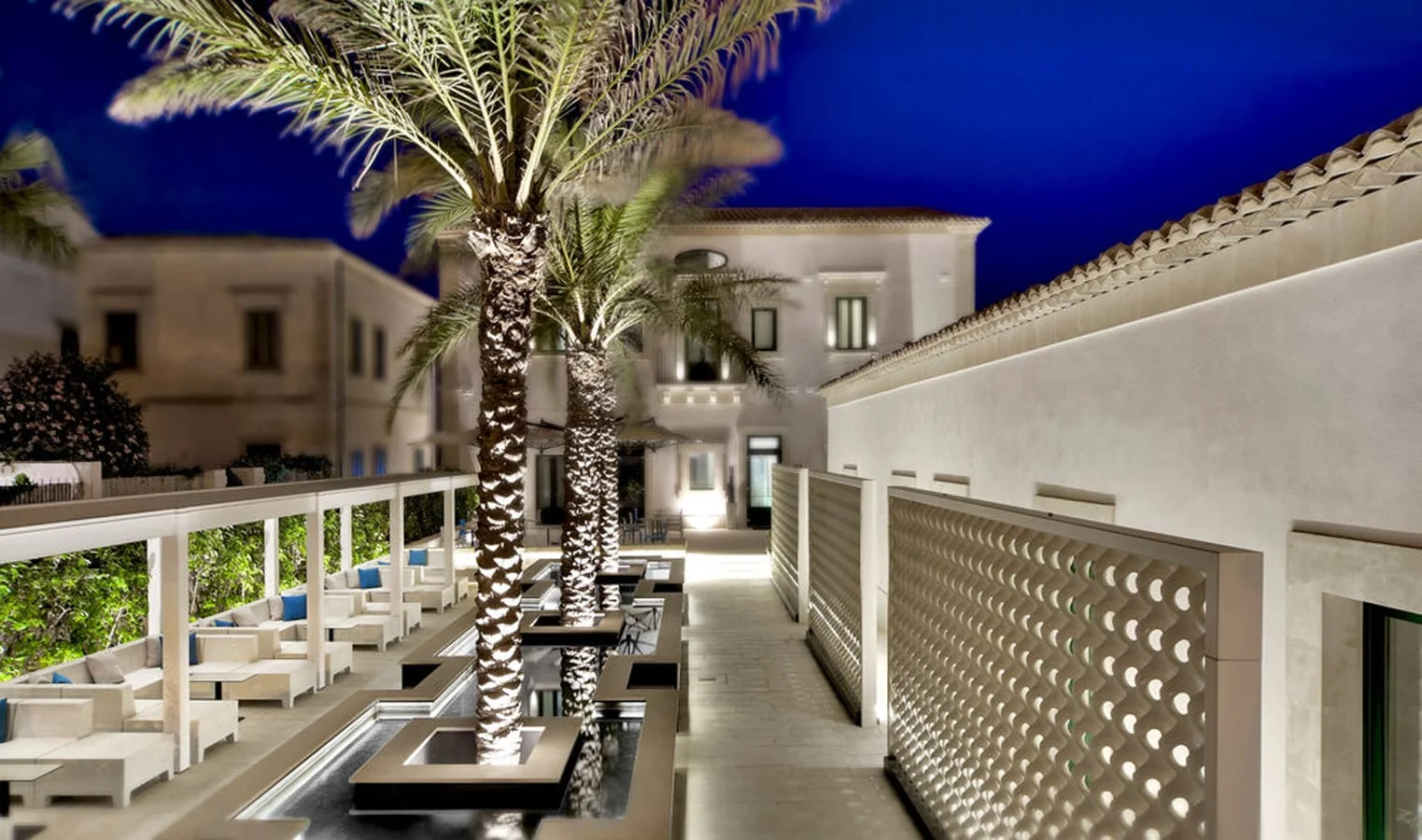 BOUTIQUE HOTEL COURTYARD FEATURING ERWIN HAUER WALLS