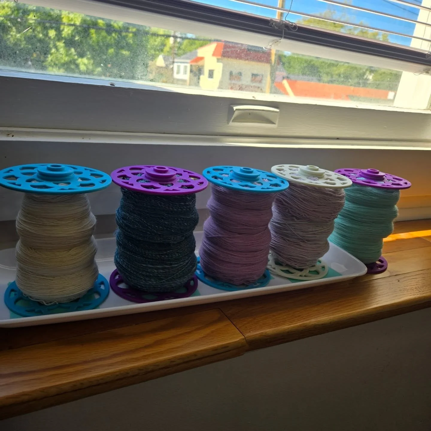 The waiting room. Just some bobbins waiting to be plied. #spinnersofinstagram #yarnaddict #spinningyarn