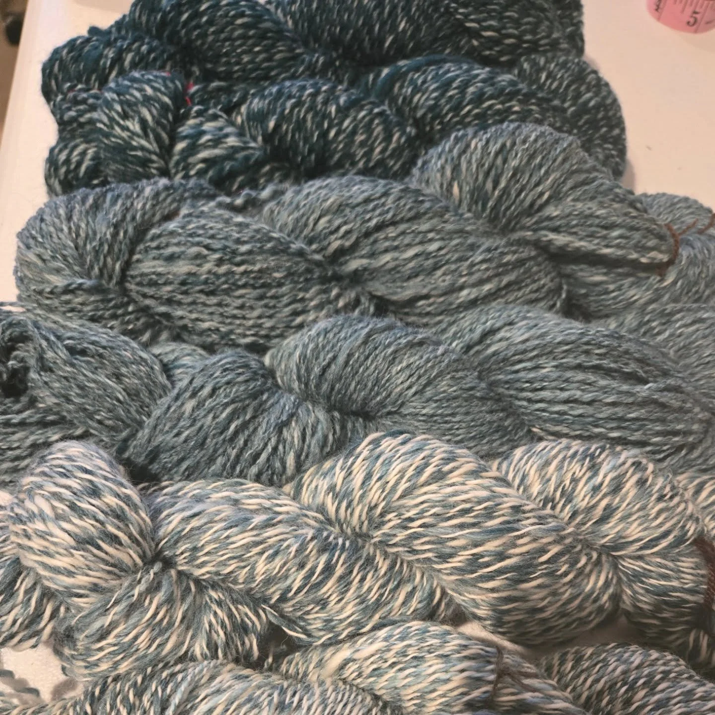 The first colorway of what I'm calling the 'Mox & Match Merino' project is done. Sadly, the darker shade (the first that I spun) is worsted weight. Then I decided I wanted it even lighter. The rest is DK. Pattern inspired by these coordinating co