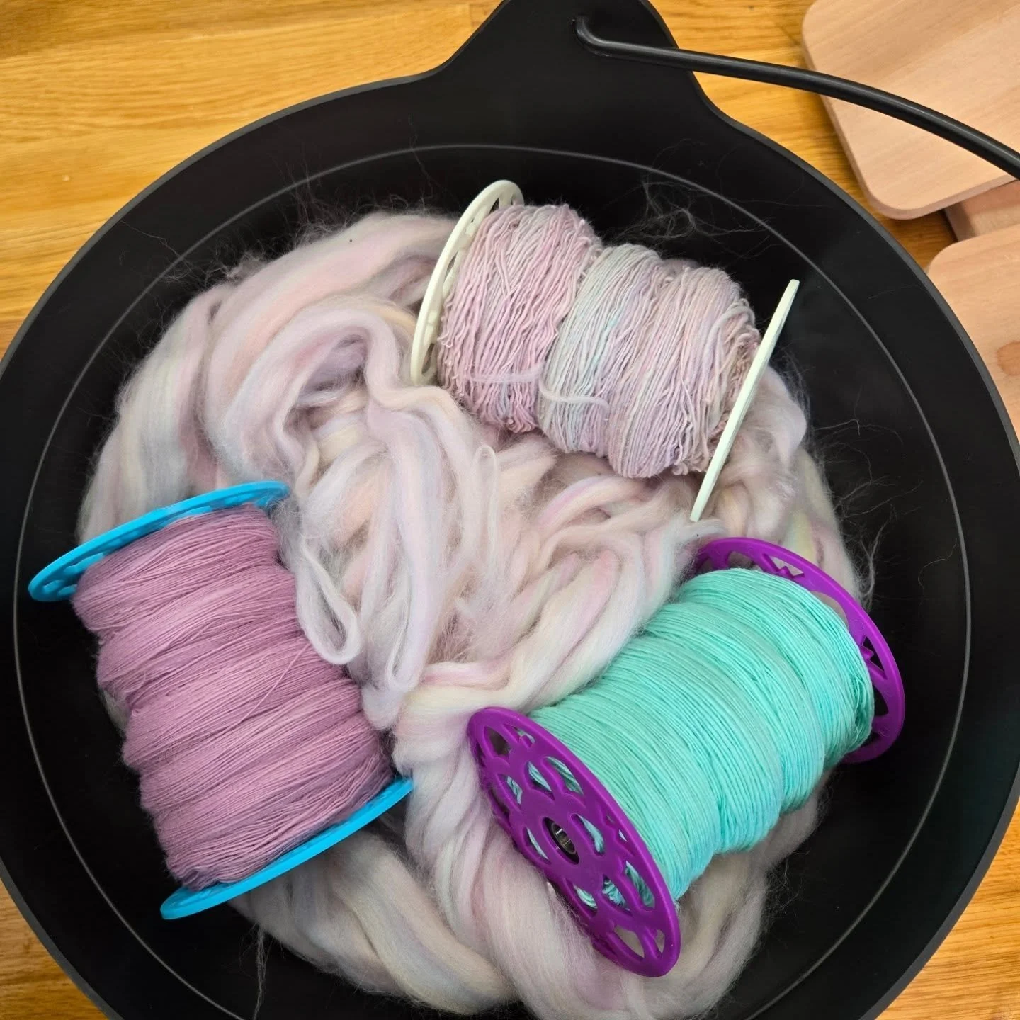 Next coordinating colorways group for the 'Mix & Match Merino' project. Yes, I keep my prepped fiber in a plastic cauldron. It's the right size and easy to clean after each spin (also for reasons my readers will understand). #spinnersofinstagram
