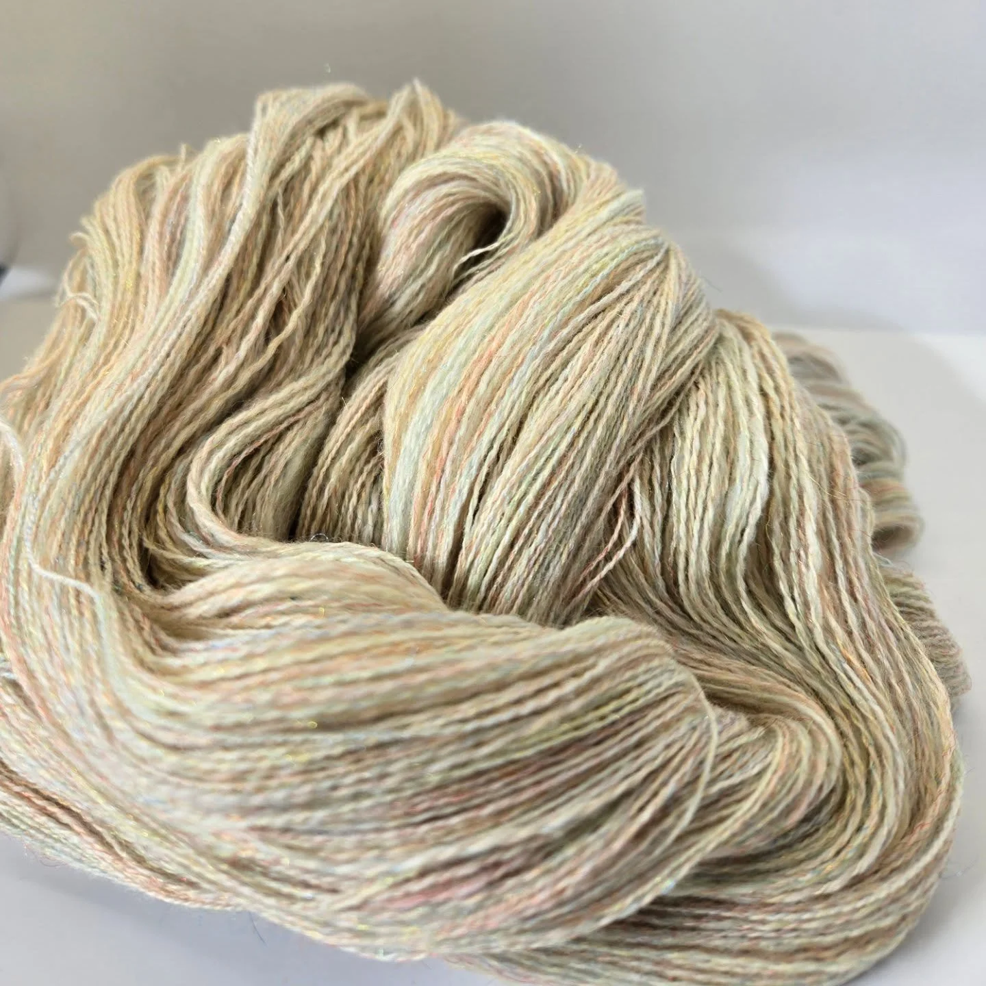 Here it is all plied and finished. 'Specimin 591' from @the.fiberists spun as fine as I can into around 1200 yards of 2 ply lace weight. These colors are amazing. Trying to decide what I want to knit with this. What do you suggest? #handspunyarn #lac