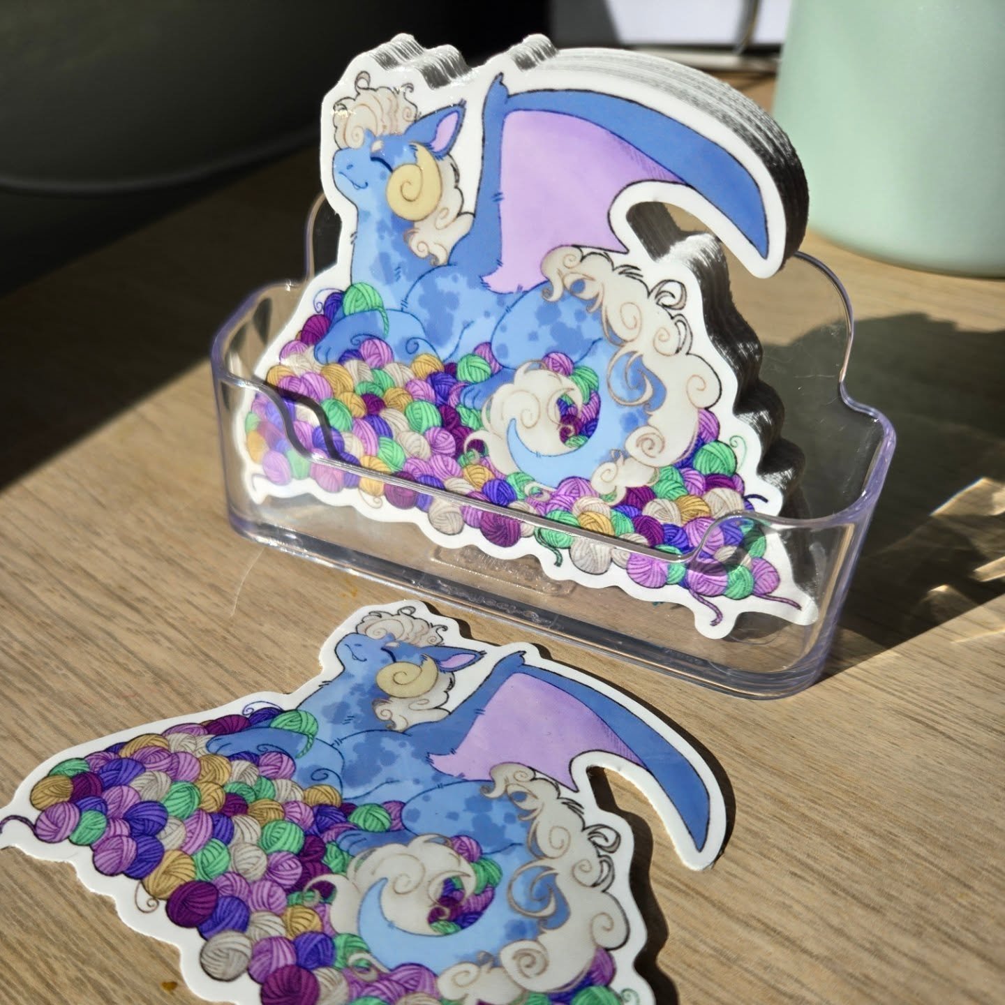 I now have Hank the Dragon vinyl stickers in the shop and on my website. You can put Hank on your favorite water bottle, device, needle case...anywhere you like. 
#characterart #hankthedragon #yarnlover