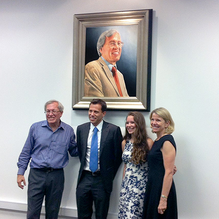 Erwin Chemerinsky with family pose with portrait