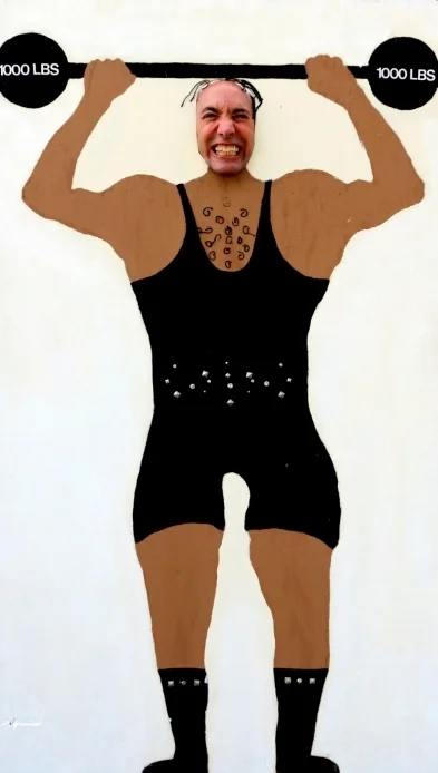 Strongman Photo Front: Makes anyone a super strong man. Great for photos or just for fun. Measures about 4' wide and 6' tall, wood.