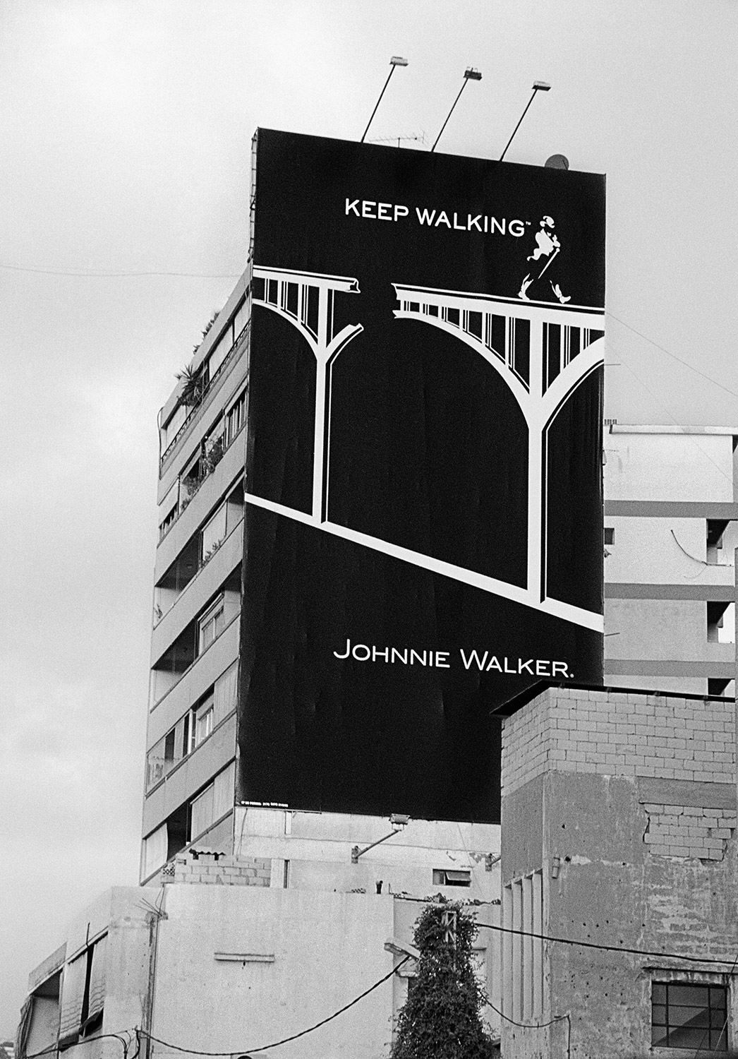   Johnnie Walker Post-War Advertisement.&nbsp;After 2006 Conflict. Beirut, Lebanon, &nbsp;2006 - 2014  Archival Fiber Inkjet Print  10 x 15.5&nbsp;inches 