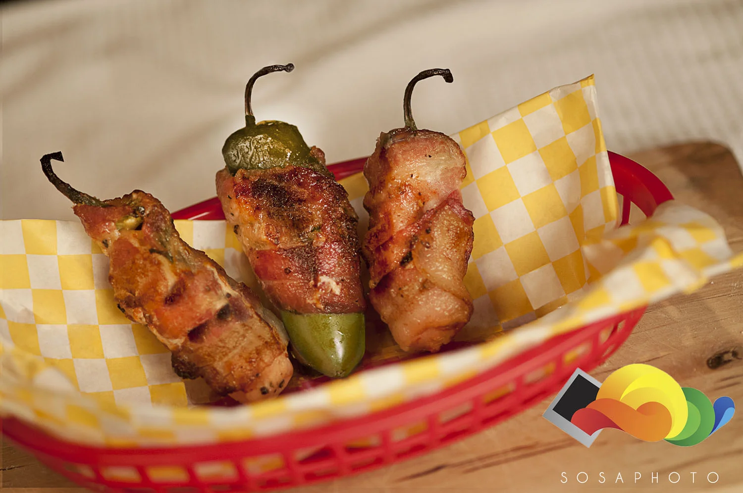 Jalapeños stuffed with Chicken and Swiss Cheese wrapped in bacon; ©Sosaphoto2013