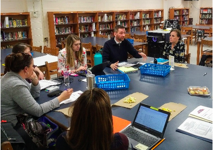 Calcutt’s Principal Leadership Team examines data together