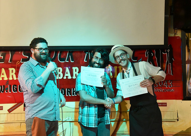 Rafi and Gus receive their certificates of achievement for first time public performance of their arrangements, presented by Jude, at Voices of Gotham's Tin Pan Alley Quartet Contest in March 2015. Photo by Steve Severinghaus .