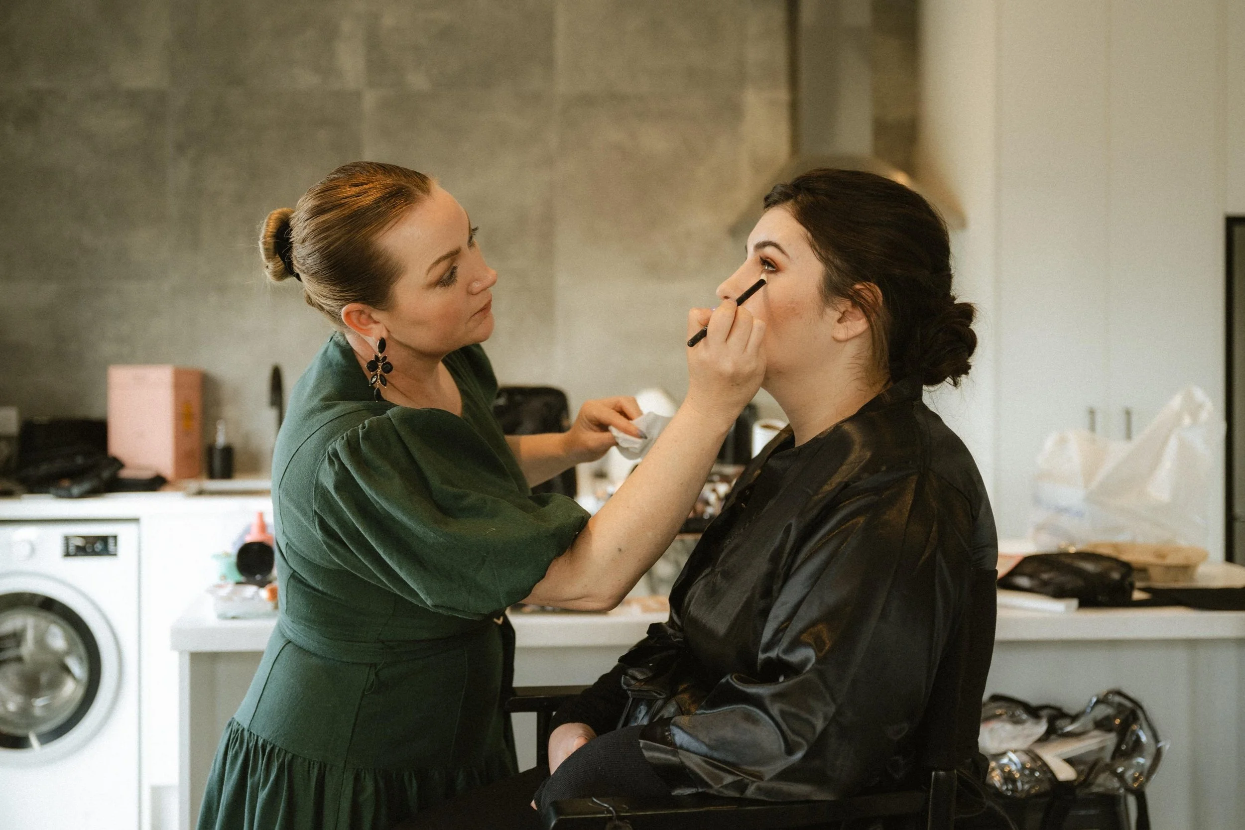 Cindy applying makeup