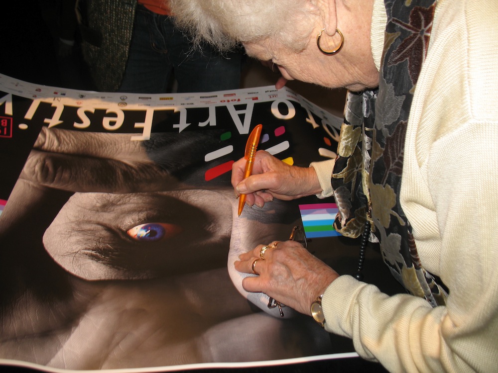 Naomi Rosenblum autographing her book "A World History of Photography"