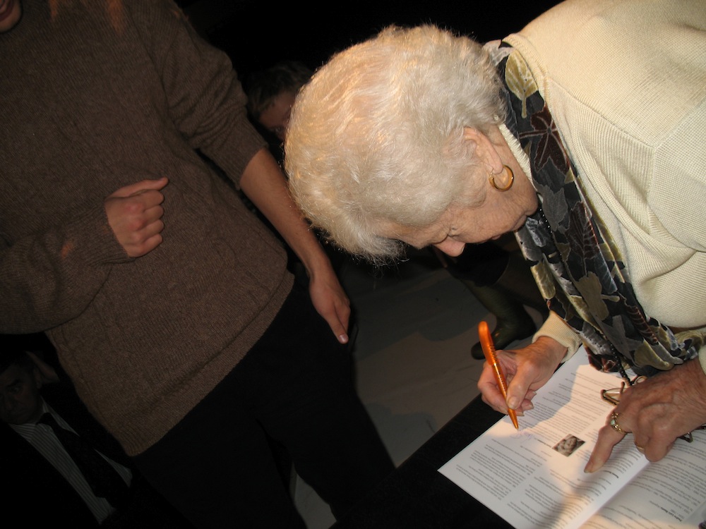 Naomi Rosenblum autographing her book "A World History of Photography"