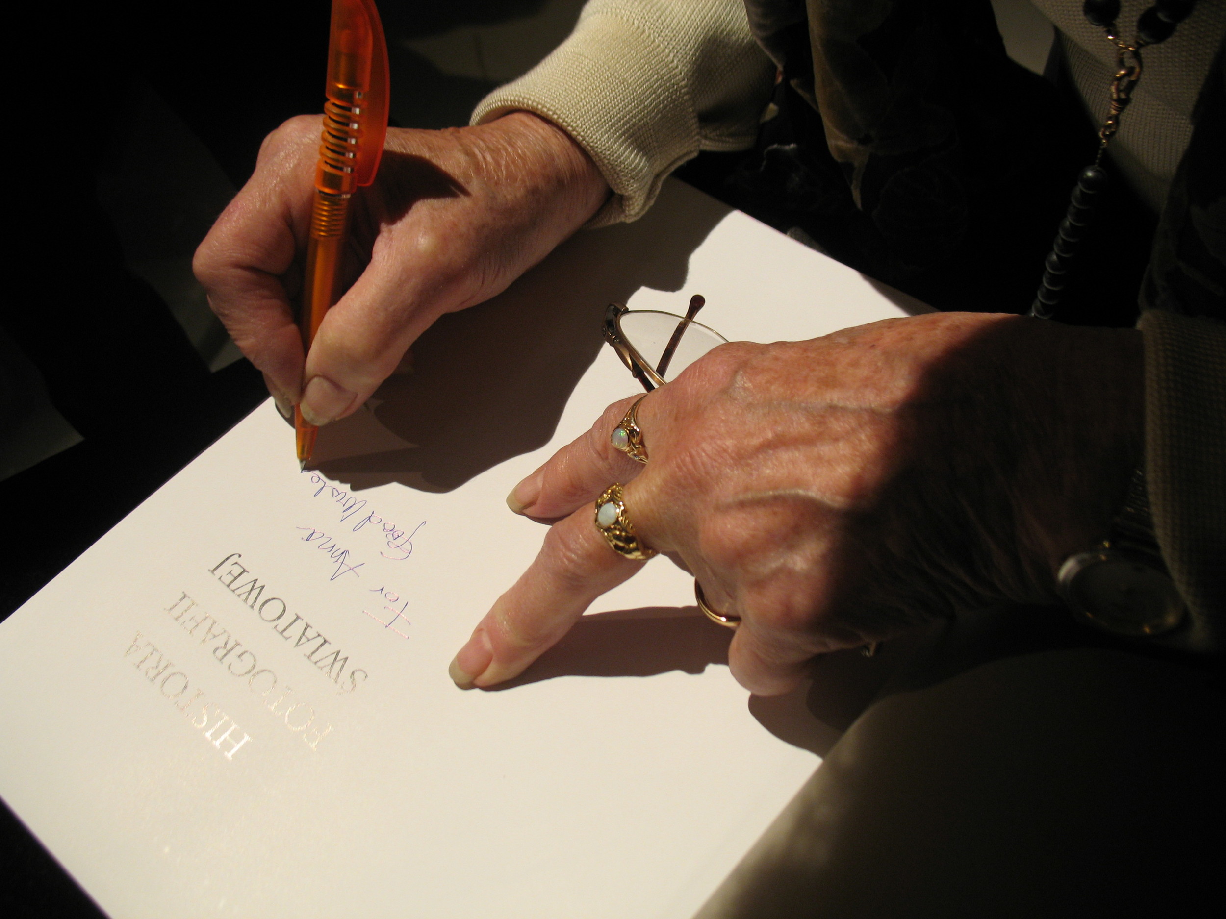 Naomi Rosenblum autographing her book "A World History of Photography"