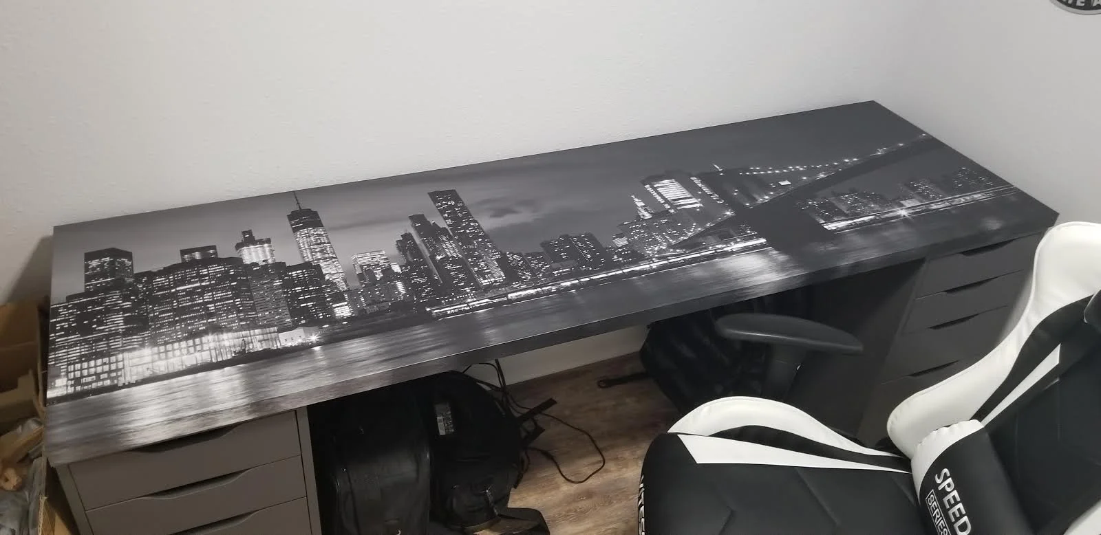 New York city with Brooklyn Bridge, iconic skyline panorama at night in black and white table wrap