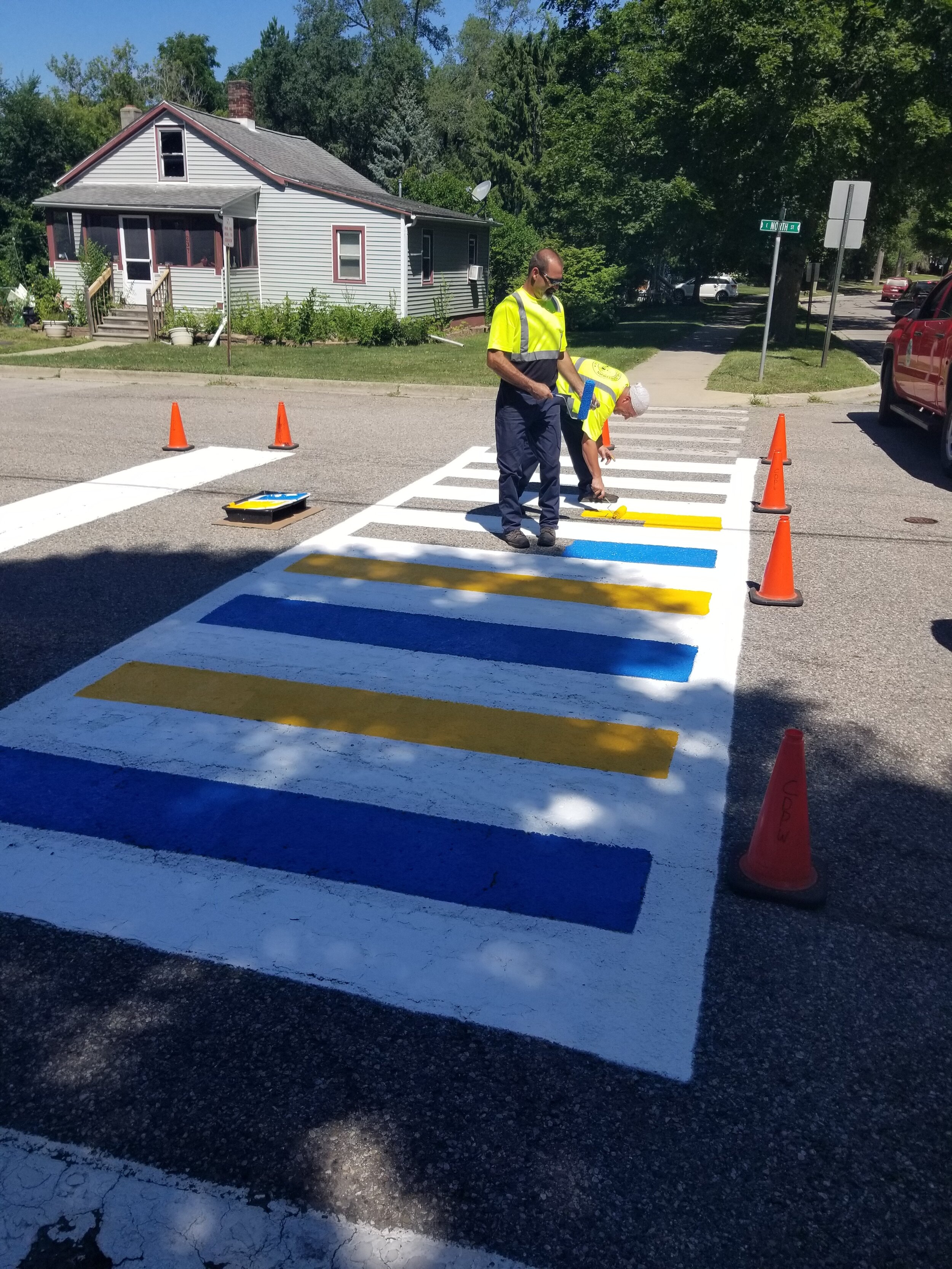 Chelsea DPW apply brightly colored paint to crosswalks along McKinley Street. 