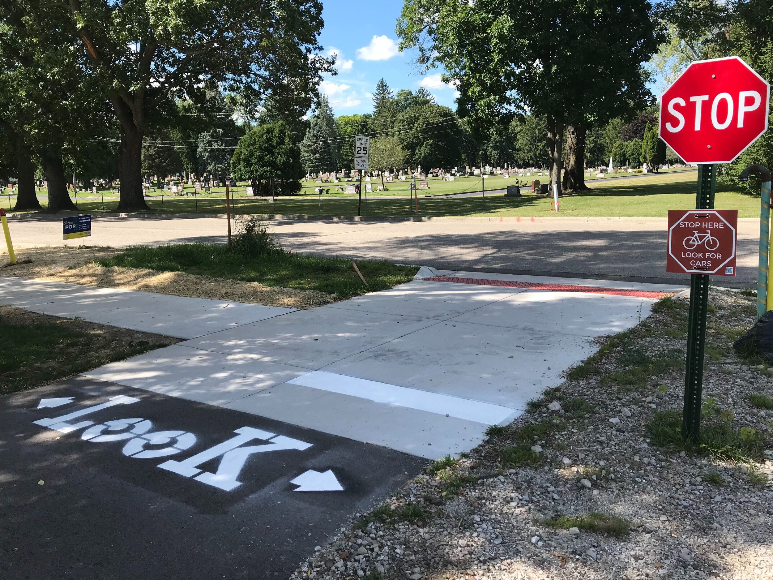  A new stop bar, “Look” markings, and stop sign have been added to the B2B trail at N. Freer Road. 