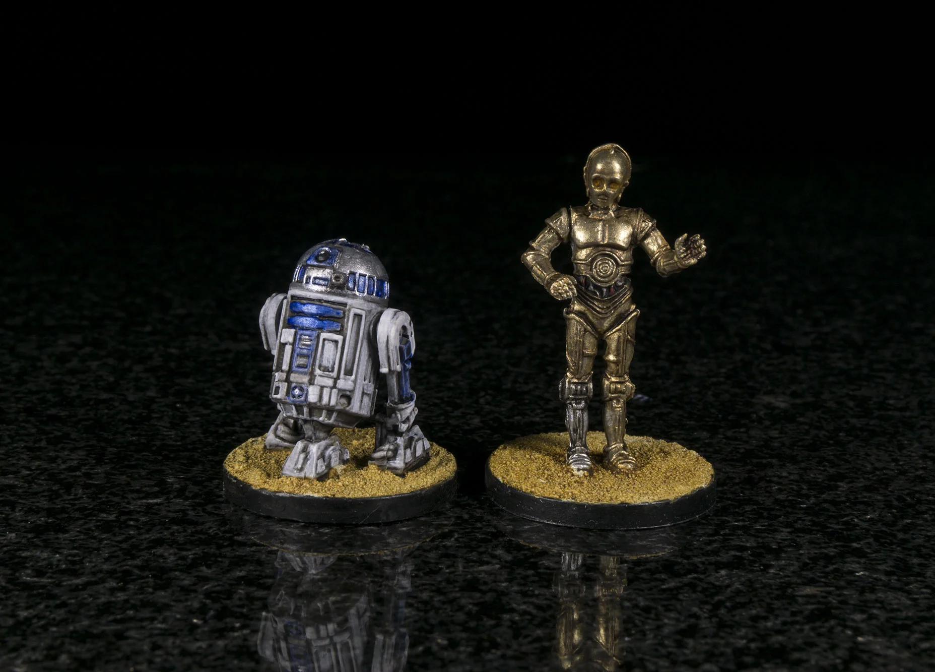 Artoo's silver is Warcolour's Pewter highlighted with their Silver. Threepio is Warcolour's Gold and Pale Gold (shaded with Citadel Agrax Eathshade and Seraphim Sepia)