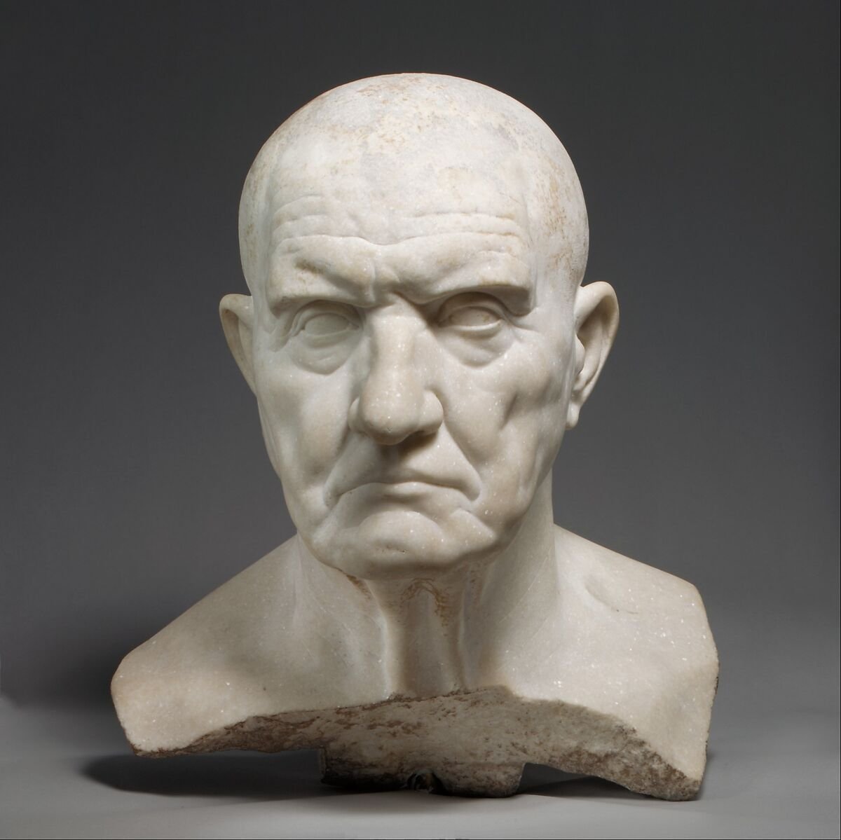 White marble bust of an older man