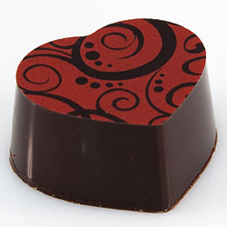 Chili-lakrits chokladpralin.