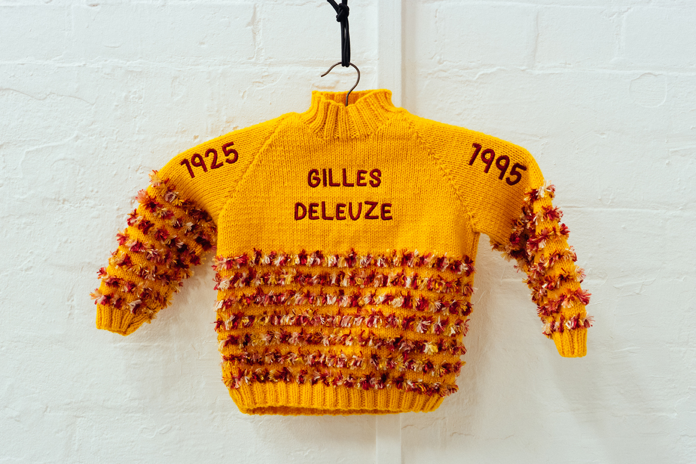   Gilles Deleuze , Found child's jumper with embroidered text, 2015 