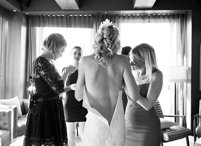Minutes before walking down the isle. Final touches and fashion tape. Perfection. 
This awesome wedding took place at Skylark, a beautiful space in midtown with sweeping views of the city.
I remember photographing the space for a newspaper article wh